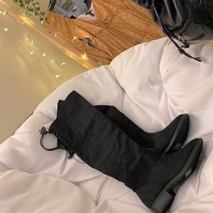 Knee-High black boots. Never worn